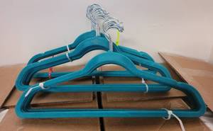lot 504 image: LOT OF VELVET HANGERS IN COLORS AS SHOWN.