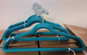 lot 505 image: LOT OF VELVET HANGERS IN COLORS AS SHOWN.