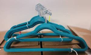 lot 507 image: LOT OF VELVET HANGERS IN COLORS AS SHOWN.