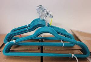 lot 510 image: LOT OF VELVET HANGERS IN COLORS AS SHOWN.