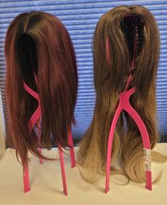 lot 527 image: LOT OF 2 WIGS IN STYLE AND COLOR(S) AS SHOWN WITH SINGLE COLLAPSIBLE WIG HOLDER. (SOLD 2 X THE MONEY)