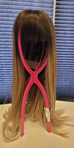 lot 530 image: WIG IN STYLE AND COLOR AS SHOWN WITH COLLAPSIBLE WIG HOLDER.