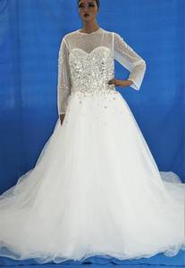 lot 50 image: SEQUINS WEDDING DRESS IN DESIGN AND COLOR AS SHOWN.