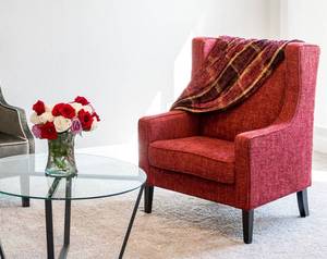 lot 52 image: RED VELVET ACCENT ARMCHAIR IN STYLE  DESIGN AS SHOWN. OTHER ITEMS NOT INCLUDED