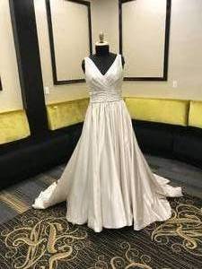 lot 444 image: WEDDING DRESS IN DESIGN AND COLOR AS SHOWN. SIZE 12.