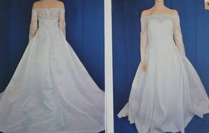 lot 45 image: LONG SLEEVE WEDDING DRESS IS DESIGN AND COLOR AS SHOWN. SIZE 28.