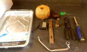 lot 36 image: New Assorted items including a High End Chisel, Wire Splicer, Twine, and Vintage Small Pry Bar, Tape Measure, & More 