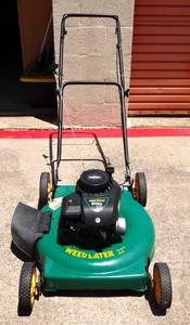 lot 51 image: Briggs & Stratton Weedeater 500 Lawn Mower - FULLY WORKS $$$