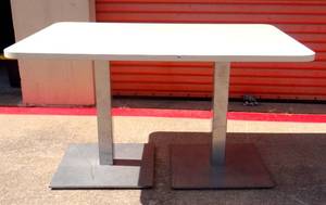 lot 82 image: LARGE RESTAURANT STYLE TABLE (38 X 54) WITH DOUBLE METAL BASE