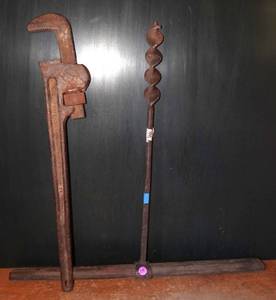 lot 215 image: VERY LARGE VINTAGE PIPE WRENCH AND HAND DRILL
