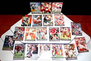 lot 248 image: NFL SPORTS CARD LOT INCLUDING THE MINISTER OF DEFENSE, REGGIE WHITE