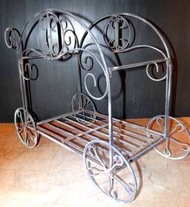 lot 251 image: ORNATE METAL MAGAZINE RACK