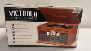 lot 4 image: Victrola 6-in-1 Turntable FM Radio Bluetooth CD Aux Built in Speakers