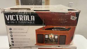 lot 5 image: Victrola 6-in-1 Turntable FM Radio Bluetooth CD Aux Built in Speakers