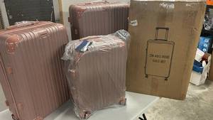 lot 159 image: 3pc Rose Gold Luggage Set w 4 Wheels & TSA lock built in