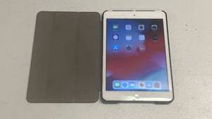 lot 216 image: Apple iPad Mini 2 - 16GB (Has small crack at top of screen) Cleared of Apple ID account