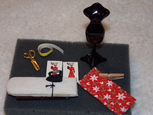lot 96 image: DOLLHOUSE SIZE TAILOR ITEMS