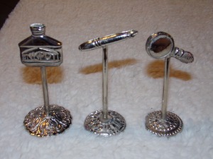 lot 109 image: INK POT, NIB PEN, AND MAGNIFYING GLASS SILVER TONE PAPER WEIGHTS