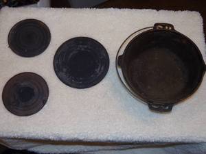 lot 41 image: Cast Iron Dutch Oven & Plates