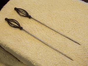 lot 44 image: Pair of Cast Iron Skewers