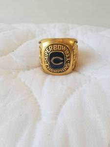 lot 13 image: Oversized brass Chicago Bears Super Bowl ring