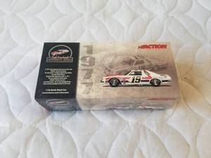 lot 27 image: Dale Earnhardt Sr. 1977 #19 Malibu Nascar racecar - Action