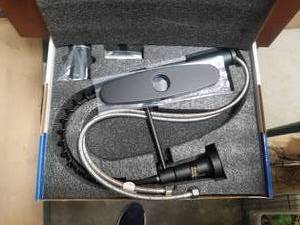 lot 67 image: Kitchen pullout faucet - never used in box - made by WeWe