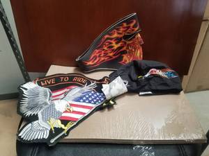 lot 75 image: Selection of riding gear - large patch, riding face mask and headgear with tags