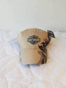 lot 128 image: Harley Davidson hat with tags