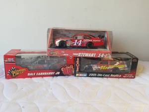 lot 134 image: Selection of 3 124 Nascar racecars - Earnhardt Jr., Stewart and Biffle
