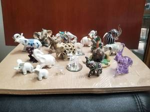 lot 79 image: Selection of glass and ceramic elephants
