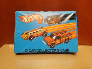 lot 163 image: Vintage 12 car Hot Wheels case with a few cars