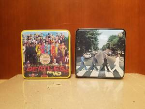 lot 172 image: Selection of The Beatles puzzles in metal collector tins