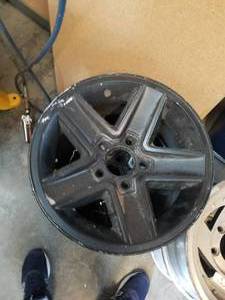 lot 339 image: Set of 4 rims off of Z28 Camero