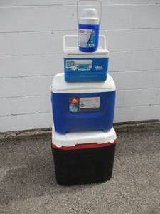 lot 25 image: 4-IGLOO COOLERS,1-13-Gal. Beverage Cooler,1-Legend-6 Cooler,1- Island Breeze 28-Qt And1-52-Qt Rolling Cooler,4xMoney