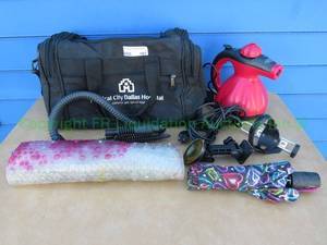 lot 101 image: LOT-Carry bag, clothes steamer, totes umbrella, and rubber bathtub mat