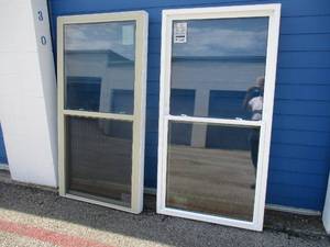 lot 83 image: 4-34 x 66-H, Never Installed-Like New Windows With Vinyl Frame, With Screens, Note  X The Money