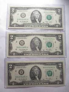 lot 14 image: 3-$2.00 Bills, 1-2009 and 2-2013, in protective sleeves- Note Starting at 6-X Money- ($2.00 Each)