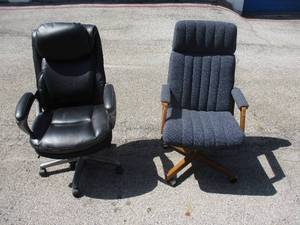 lot 34 image: 2-Office Arm Chairs On Casters, 1-Cloth and 1-Leather