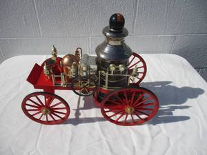 lot 29 image: COLLECTIBLE -JIM BEAMS 1867  MISSISSIPPI  FIRE ENGINE No. 313 WITH COMMEMORATIVE DCEANTER BOTTLE