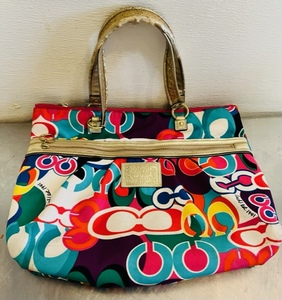 lot 12 image: Multi-Patchwork Coach Purse