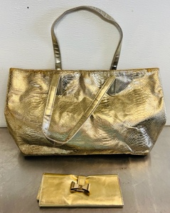lot 13 image: Gold Snakeskin Pattern OPTKA Purse with Gold Tarte Makeup Bag