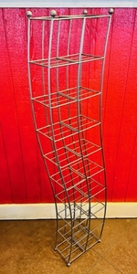 lot 28 image: 52x11x6 Stylish Metal CDs or Video Game Rack