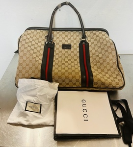 lot 83 image: Brown &amp Tan Gucci Bag