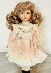 lot 100 image: 13 Curly Blonde HairPink Dress Doll w Stand
