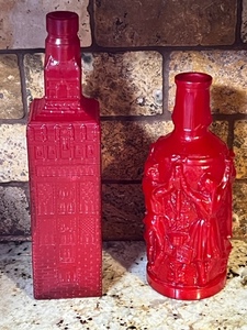 lot 179 image: Two Made in Spain Red Decorative Bottles - 12 &amp 9