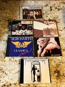 lot 187 image: 6 CDs - 2 Led Zepplin, 2 Aerosmith, 1 Fleetwood Mac and 1 Three Dog Night