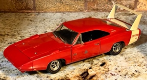 lot 192 image: Ertl American Muscle 1969 Dodge Charger Daytona Orange 118 Scale Die Cast