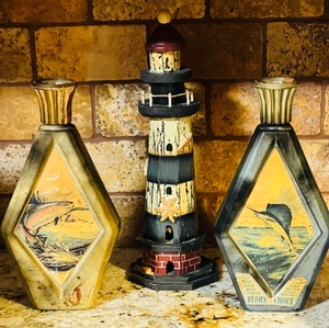 lot 201 image: Wooden 14 Lighthouse w2 Beams Choice James Lockhart Artwork Commemorative Bottles