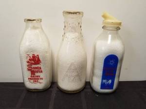 lot 152 image: Selection of 3 vintage glass milk bottles - Santa Maria, RAM, and Promised Land dairies